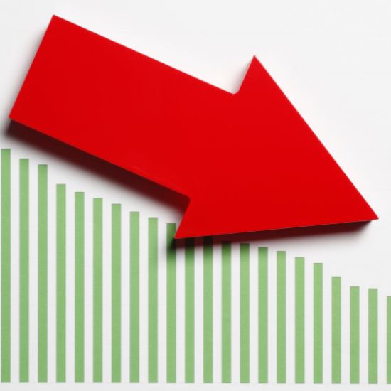 A sales chart shows a red arrow pointed down to the right.